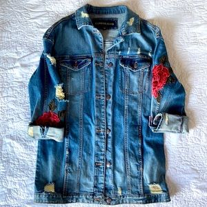 Distressed denim jacket